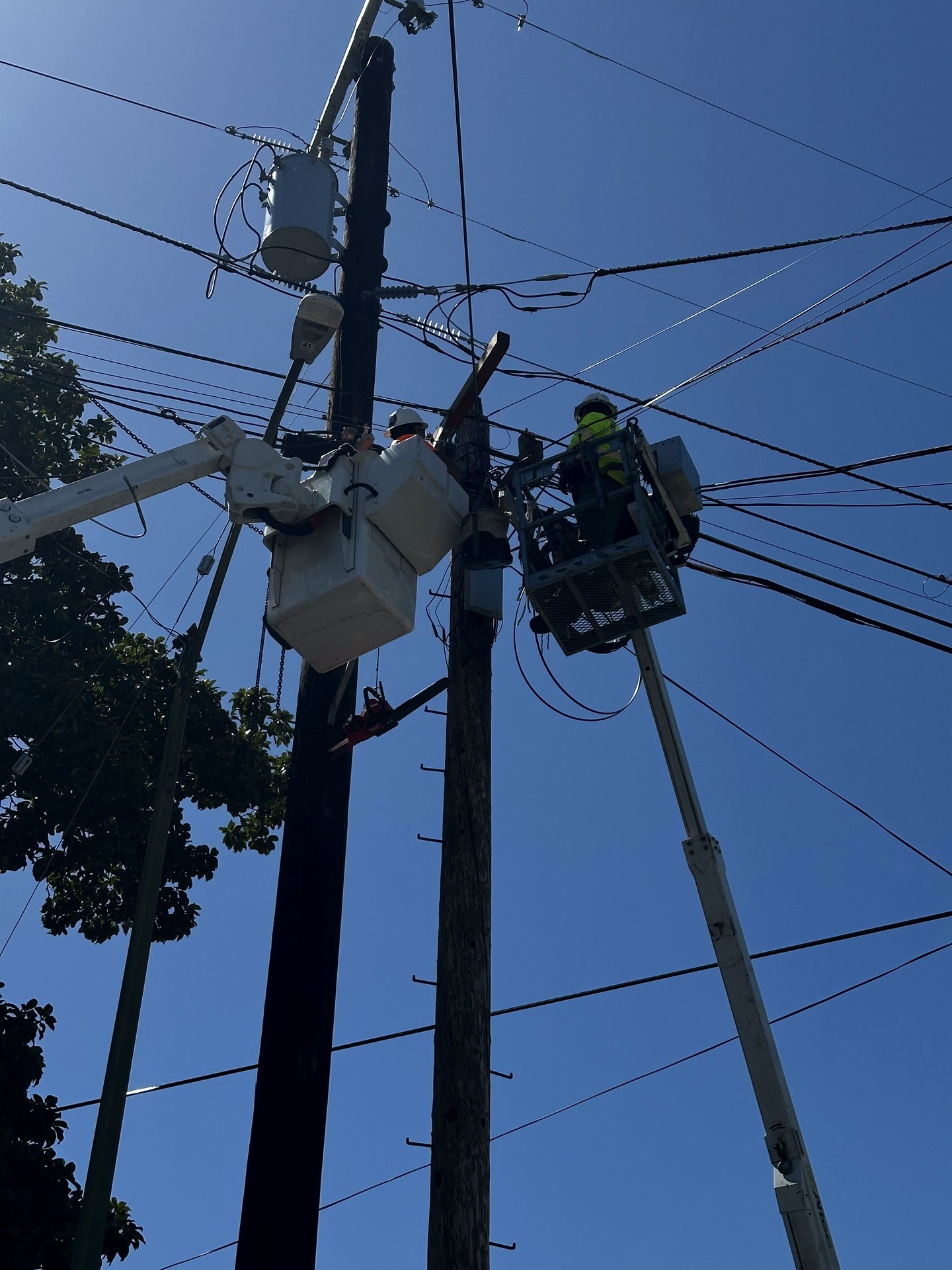 Bucket-truck work on overhead service lines